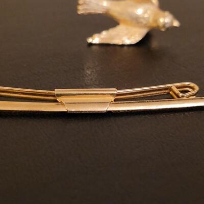 Lot 525: Brooches, Pins and Tie Clip