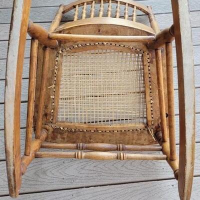 Lot 547: Antique North Wind Rocker with Cane Seat late 1800's/early 1900's