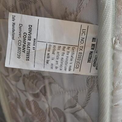 Lot 552: Full Size Bed with Casters & Denver Mattress Set