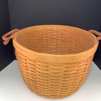 A. - 197. Signed, Large Round ( Wildflower ) Longaberger Basket with Swing Handles & plastic liner 