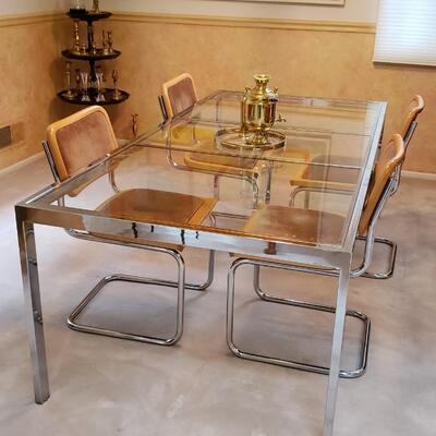 Glass and chrome dining table and 4 chairs
