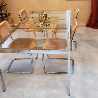 Glass and chrome dining table and 4 chairs