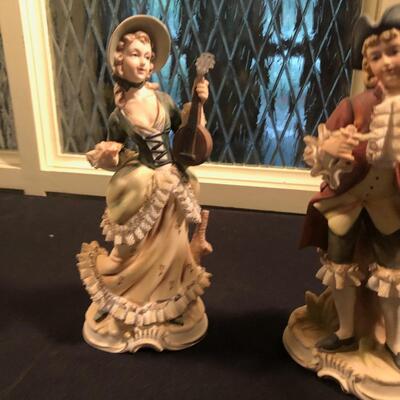 #66 Pair of porcelain statues with instruments by ardco 