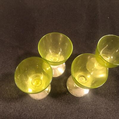 #108 Four green glass brandy cups