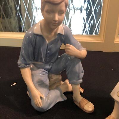 #138- Hand painted statues could be Lladro but not marked boy and girl