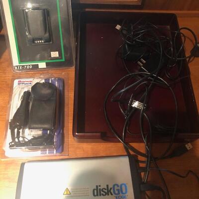 #193 External hard drive and old flip phone cell phone charger and accessories
