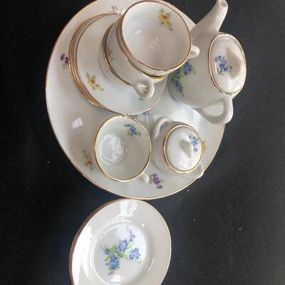 #240 Miniature tea set with floral pattern missing cream container