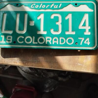 LOT 25          THREE VINTAGE COLORADO LICENCE PLATES