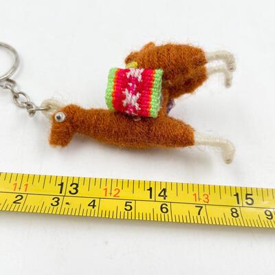 TINY ALPACA KEYCHAIN - APPEARS HANDMADE