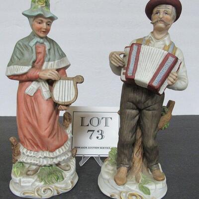Pair of Large Man and Lady Figurines