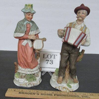 Pair of Large Man and Lady Figurines