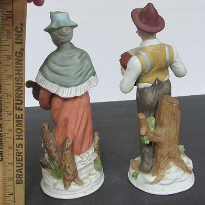 Pair of Large Man and Lady Figurines