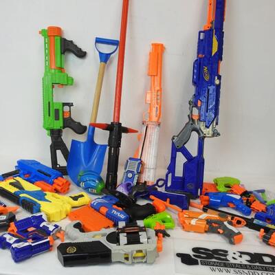 31 pc Kids: Nerf rifles, pistols, walkie talkie, shovel, etc |  EstateSales.org