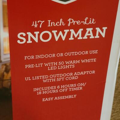 Lot 5: 47 inch Pre-Lit Snowman Winter Display 