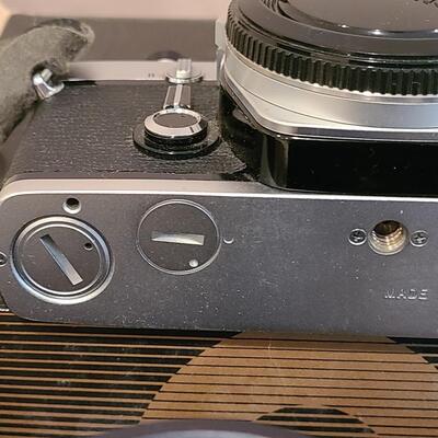 Lot 451: Olympus OM-1 Camera, Lenses, and More 