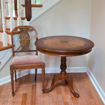 Lot 475: Round Entryway Table and Antique Accent Chair 