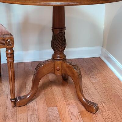 Lot 475: Round Entryway Table and Antique Accent Chair 