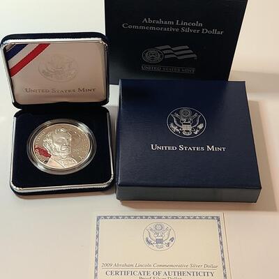 Lot 19: 2009 Abraham Lincoln Commemorative Silver Dollar 