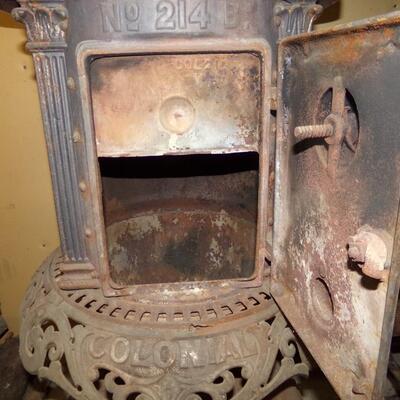 LOT 35  CAST IRON COLONIAL WOOD BURNING STOVE NO. 214