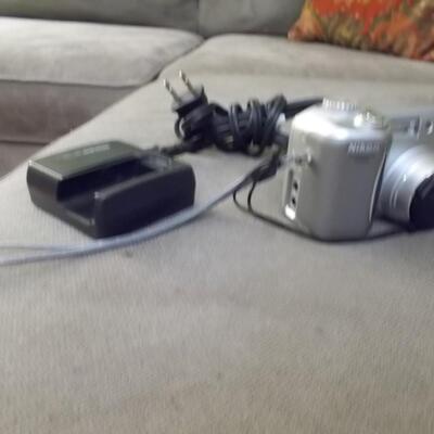 Vivitar Tripod and  Nikon Camera