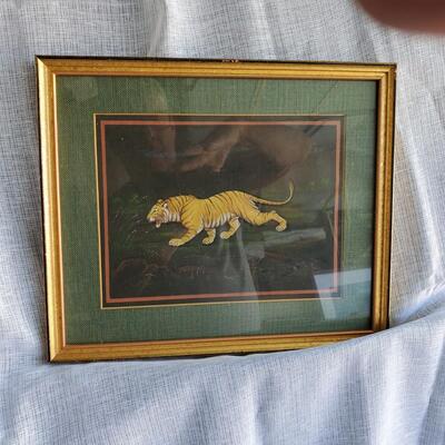 Framed Tiger picture, painted on cloth bright golds matted as well