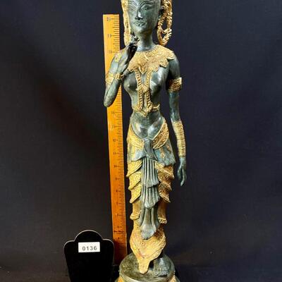 An Elongated Bronze Female Apsara Venerated Figure