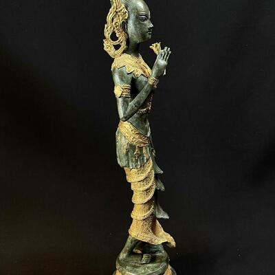 An Elongated Bronze Female Apsara Venerated Figure