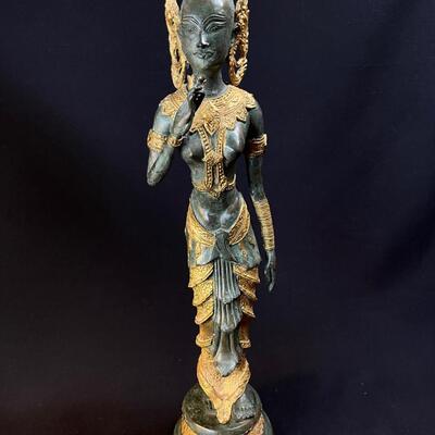 An Elongated Bronze Female Apsara Venerated Figure