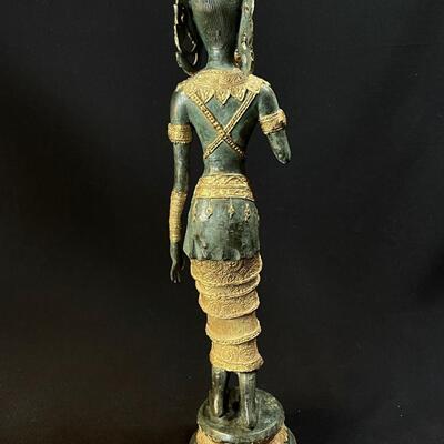 An Elongated Bronze Female Apsara Venerated Figure