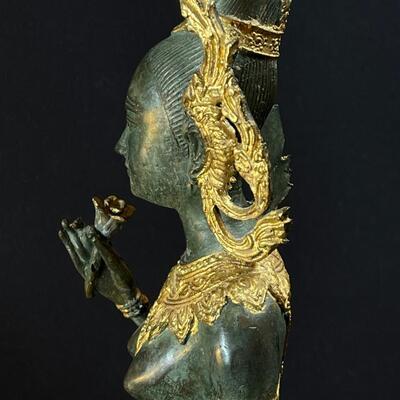 An Elongated Bronze Female Apsara Venerated Figure