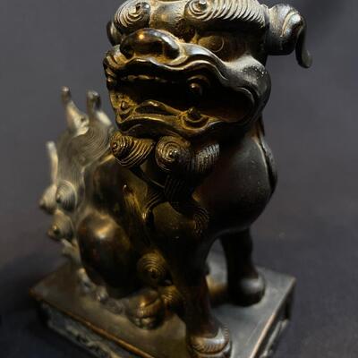 A Pair of Bronze Chinese Temple Foo Lions