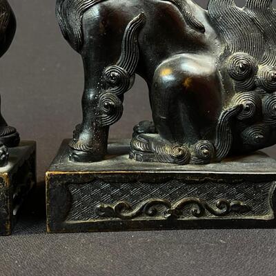 A Pair of Bronze Chinese Temple Foo Lions