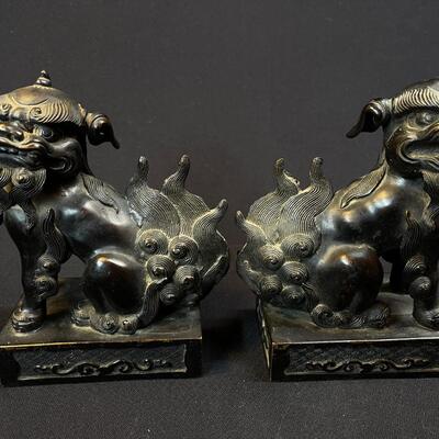 A Pair of Bronze Chinese Temple Foo Lions