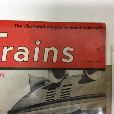 2 vintage train magazines in plastic.