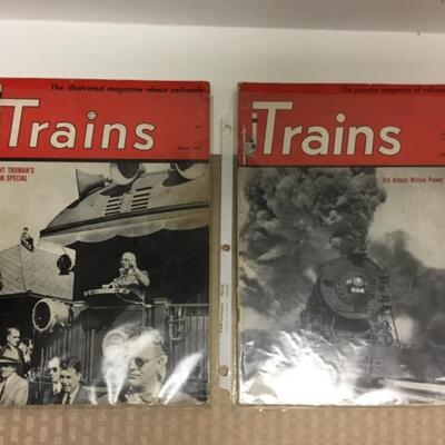 2 vintage train magazines in plastic.