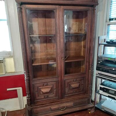 Tall oak book case cabinet
