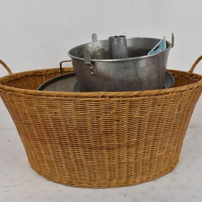 Large Basket, Bunt cake pans, assorted glass cups and mugs.