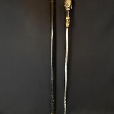 Cast Buddha Head Sword Cane Walking Stick