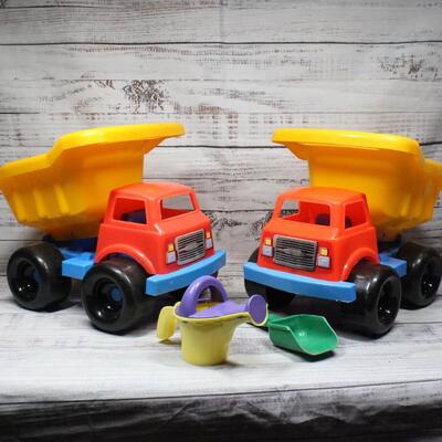Pair of Plastic Beach Dump Truck Toys