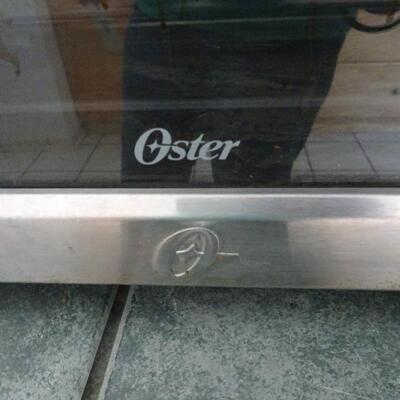 LOT 789. OSTER CONVECTION OVEN
