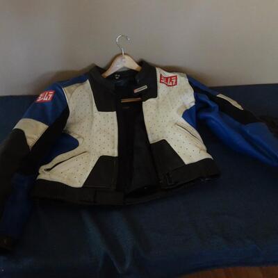 LOT 803. LEATHER MOTORCYCLE JACKET AND GLOVES