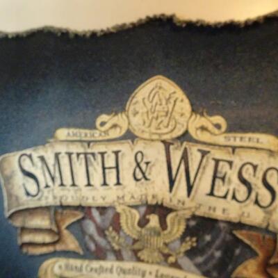 LOT 813. SMITH & WESSON WALL HANGING