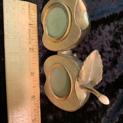 Antique and authentic collection of hand held candle sticks, trivets, etc...