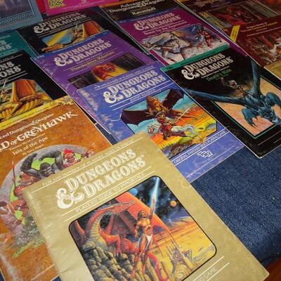 LOT 870. VINTAGE DUNGEONS AND DRAGONS BOOKS + BATTLETECH