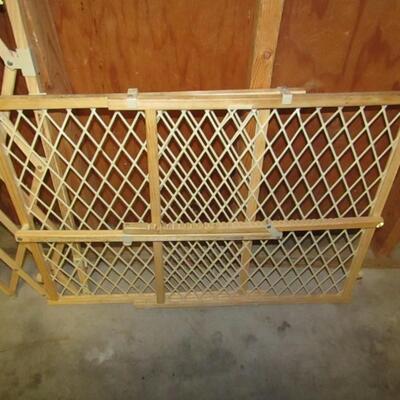LOT 143  TWO BABY GATES