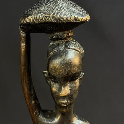 Female African Figure Balancing Pkg on Her Head
