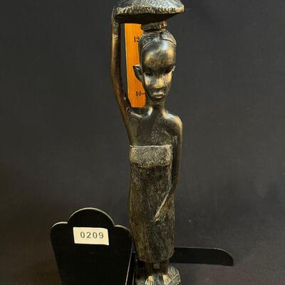 Female African Figure Balancing Pkg on Her Head