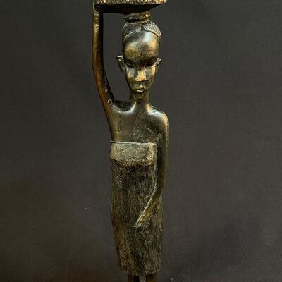 Female African Figure Balancing Pkg on Her Head