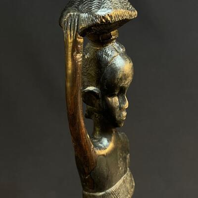 Female African Figure Balancing Pkg on Her Head