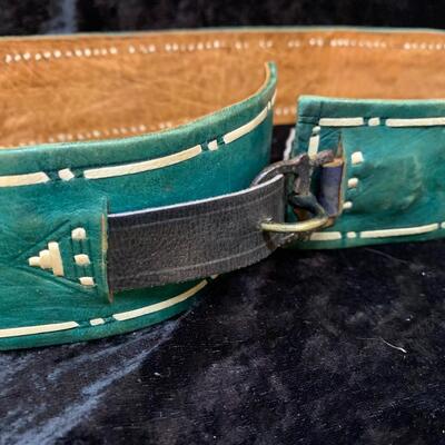 Vintage belts, perfume and other things in the bathroom cabinet